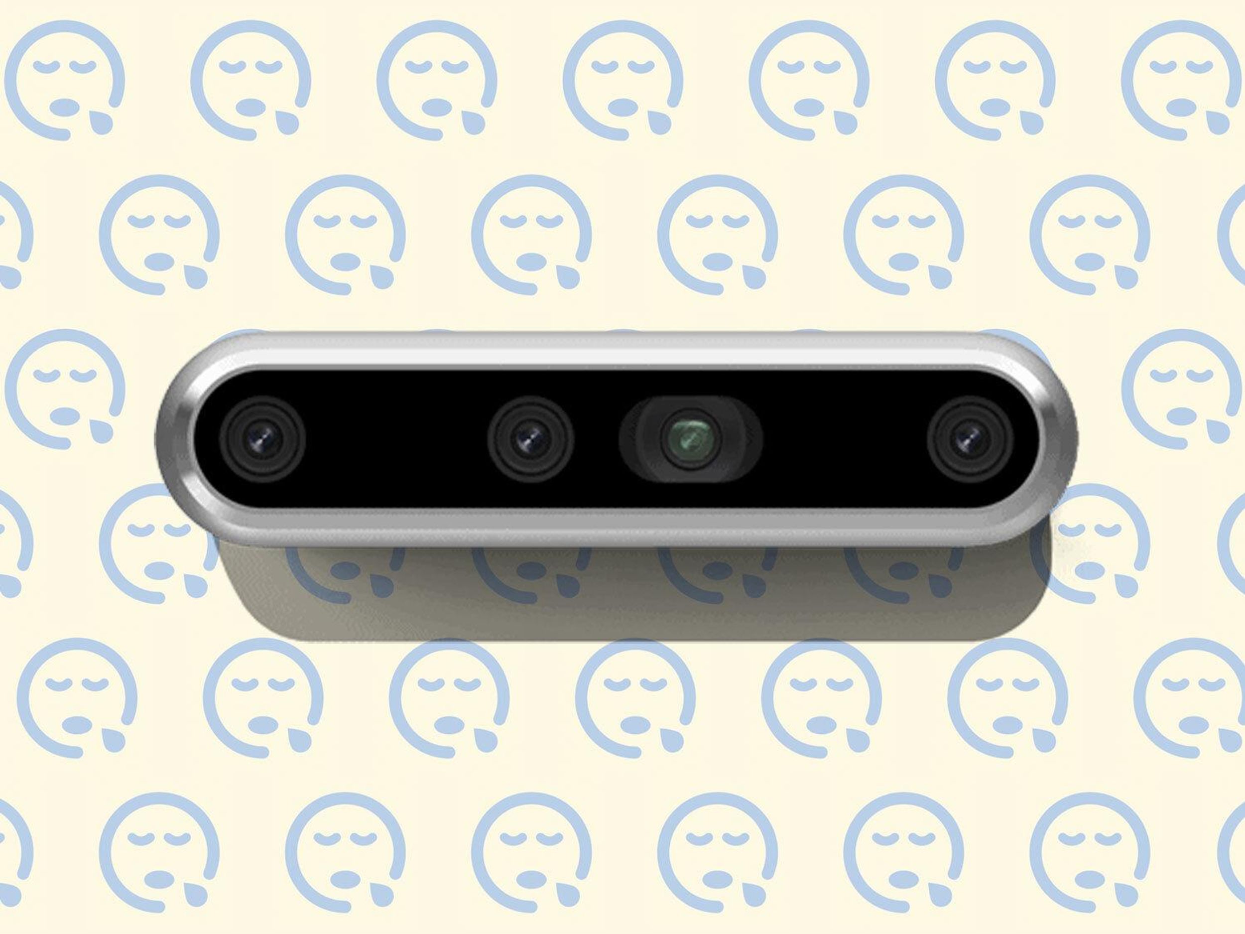 An Intel RealSense depth camera on top of phew emojis