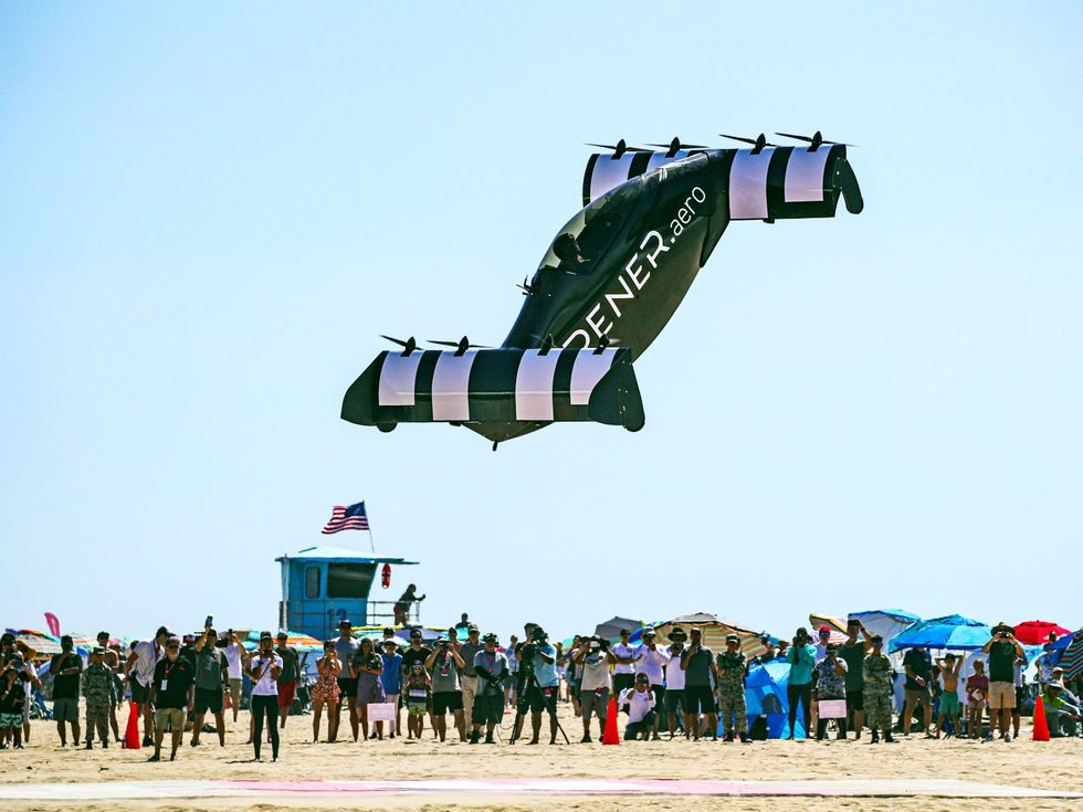 An unusual-looking aircraft takes to the skies during an airshow.