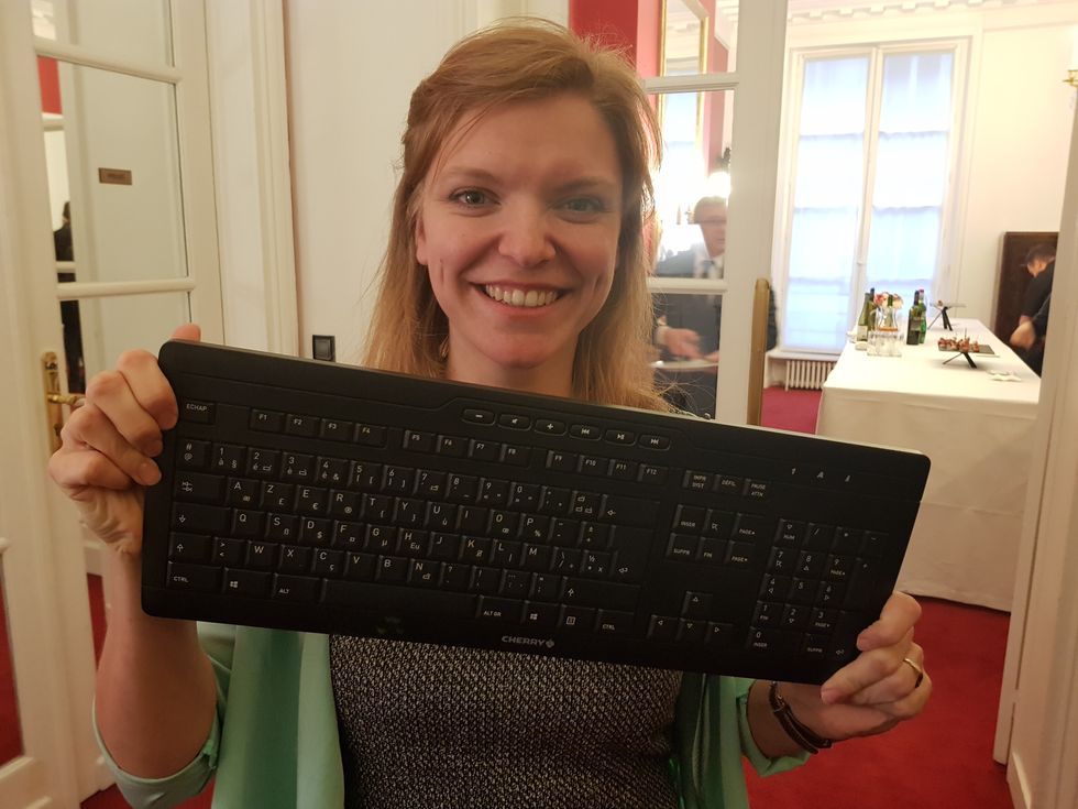 Anna Maria Feit poses in Paris with the new keyboard standard.