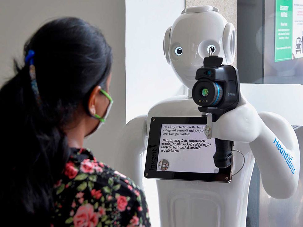At Fortis Hospital in Bangalore, India, a robot called Mitra uses a thermal camera to perform a preliminary screening of patients. 