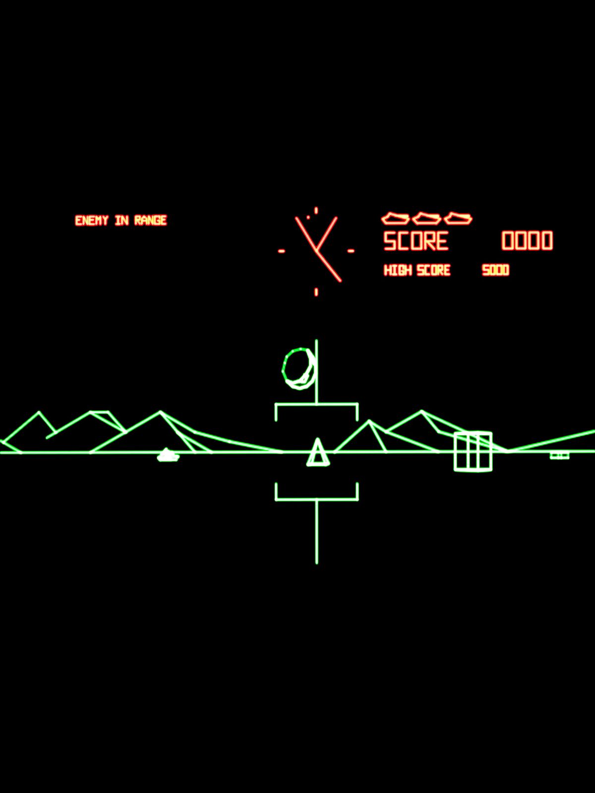 battlezone-atari-1980-arcade-videogame-screenshot-showing-score-field-at-top-in-orange-and-line-drawing-of-mountains-and-gun-sc.jpg