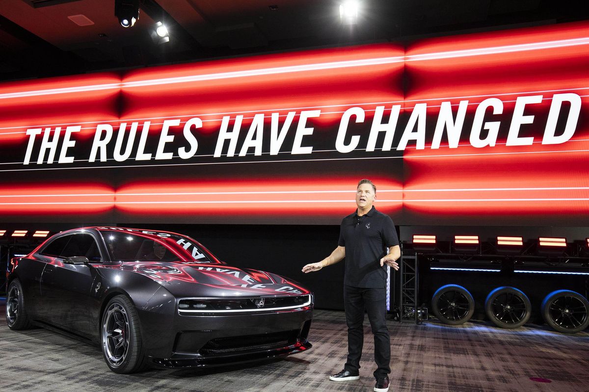 ceo-of-dodge-brand-standing-on-a-podium-