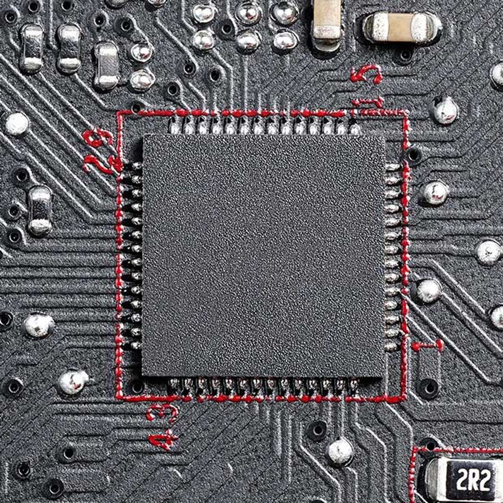 Close up image of a circuit board showing a threatened area: the power controller