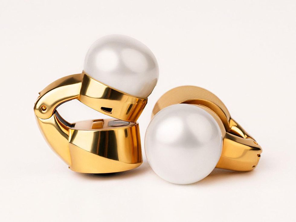 close-up-of-pearl-and-gold-clip-on-earri