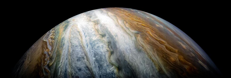 Closeup of Jupiter\u2019s swirling cloud layers, indicating the planet\u2019s very active winds