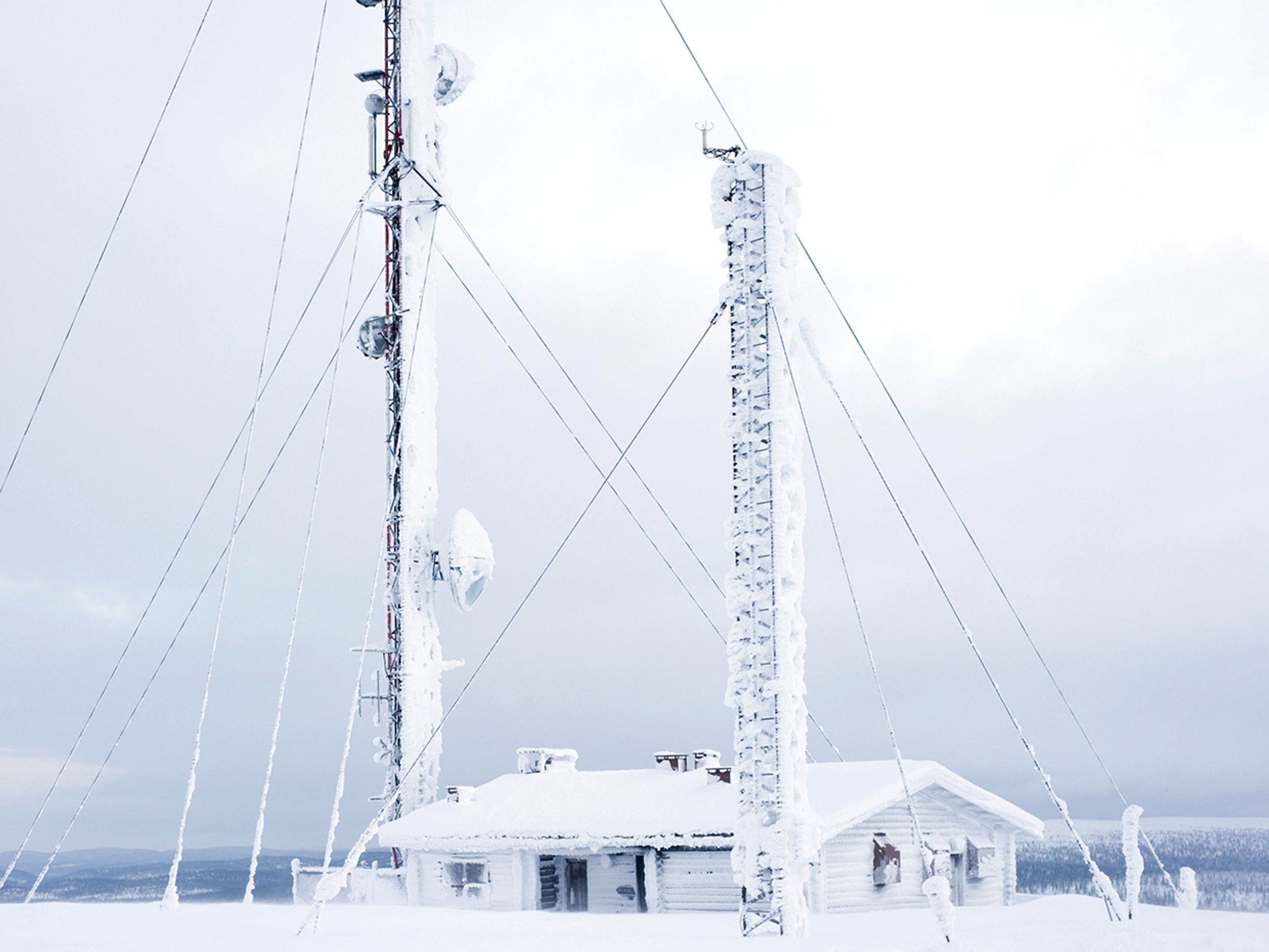 Communication tower in a Finnish winter landscape.