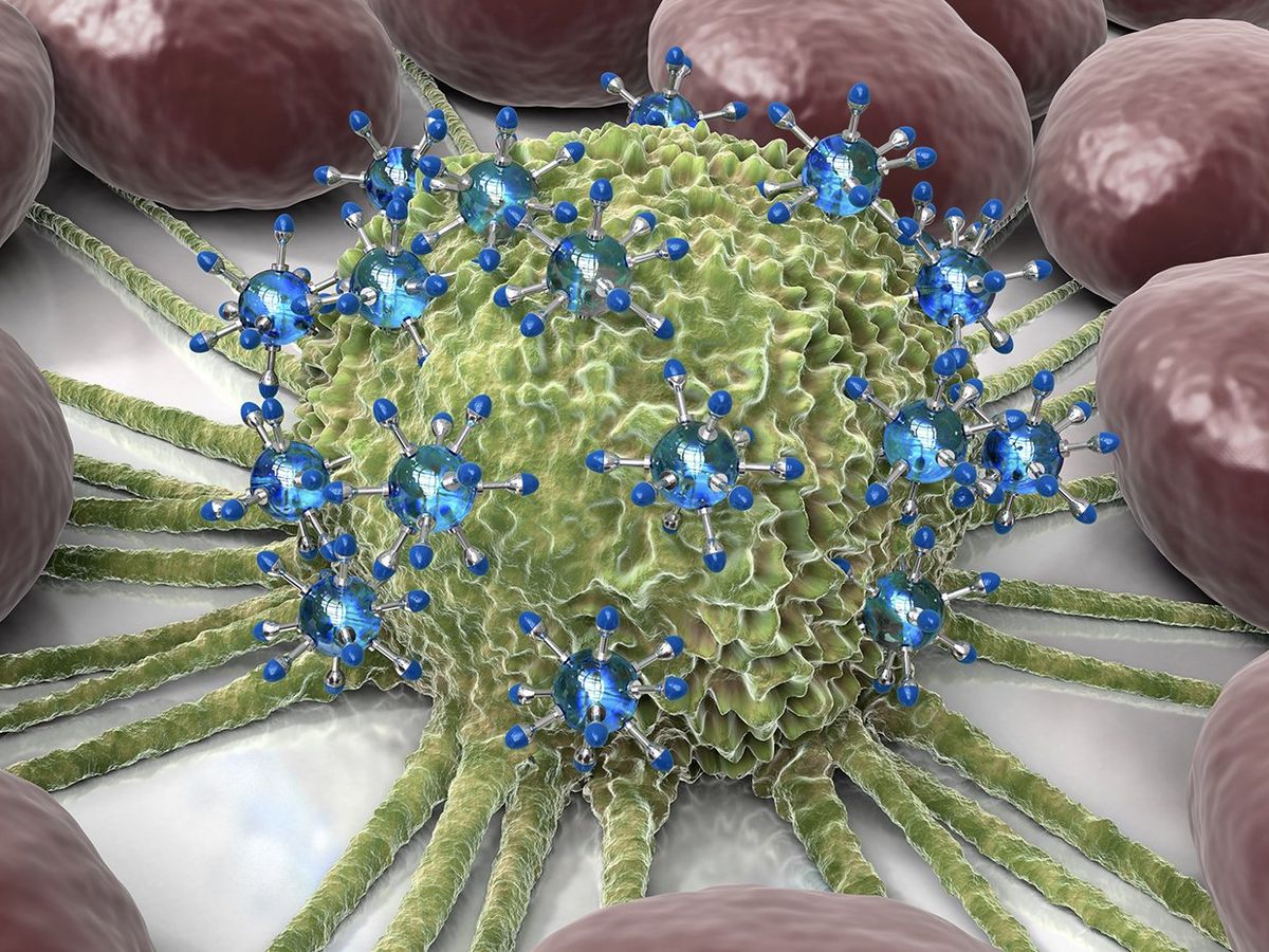 Conceptual computer artwork of medical blue nanorobots attacking a cancerous cell.