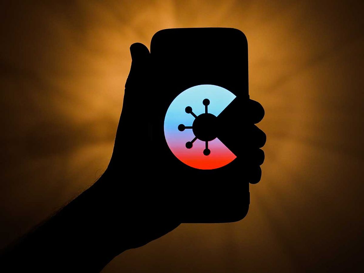 Corona-Warn-App icon is displayed on a phone screen in this illustration photo taken on June 16, 2020. Launched by German government tracking app is designed to prevent the spread a coronavirus.