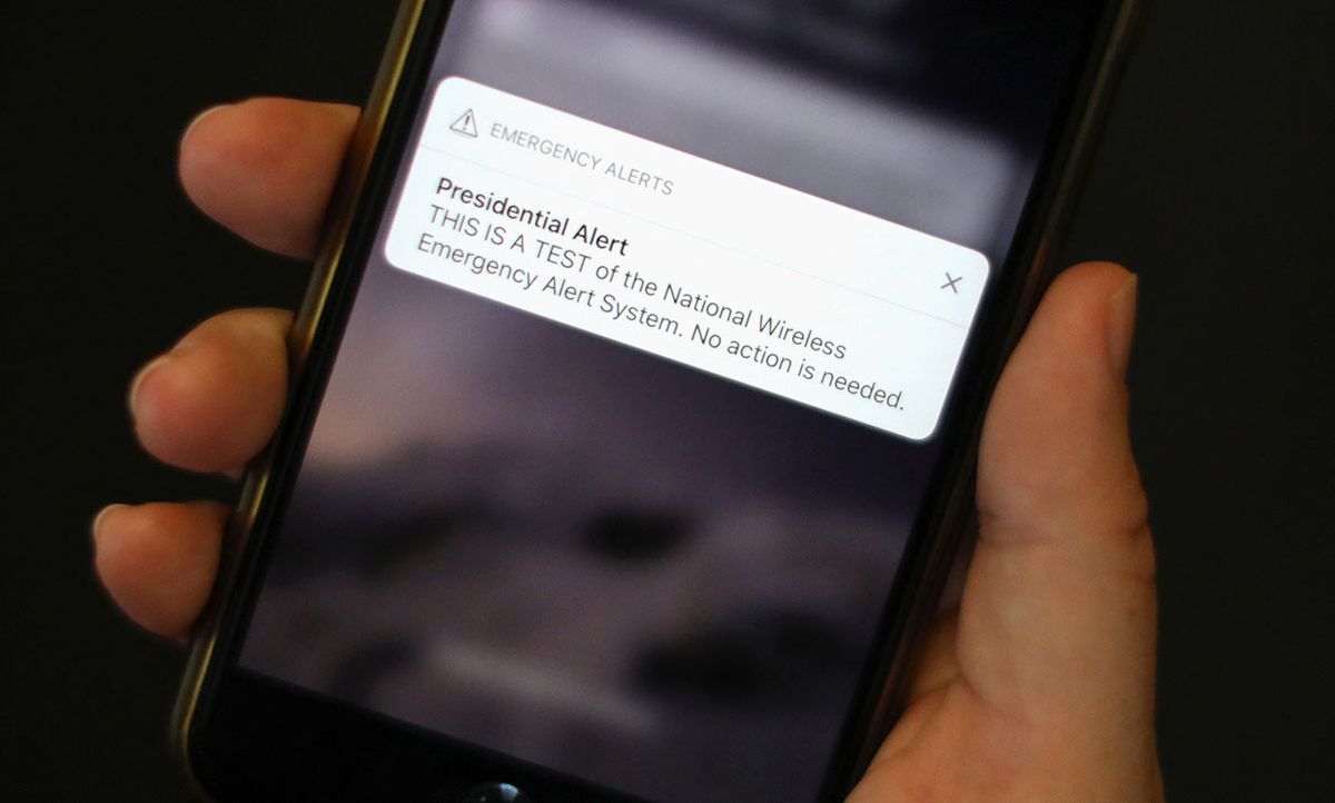 DATE IMPORTED:October 03, 2018A test text message of the Presidential Alert, National Wireless Emergency Alert System is seen on a mobile phone in New York City, New York, U.S. October 3, 2018.