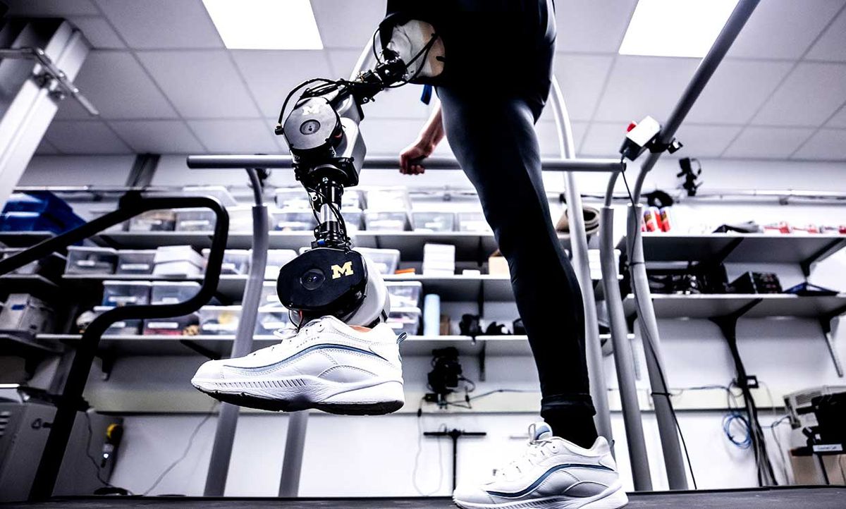 Dawn Jordan Musil tests an open-source robotic leg designed by Elliott Rouse, Assistant Professor of Mechanical Engineering, and his research group in the G. G. Brown Building on May 28, 2019.