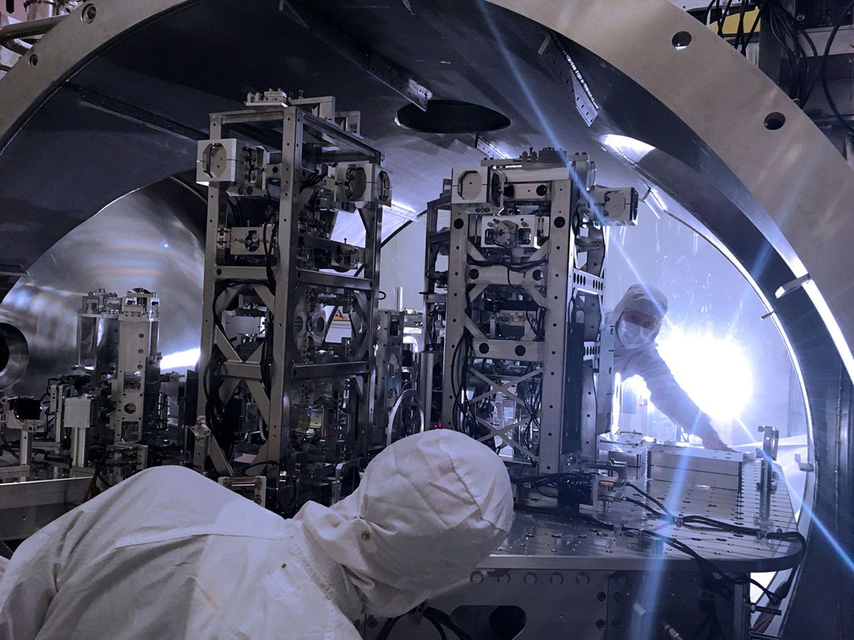 Detector engineers  are pictured here beginning the hardware upgrades inside the vacuum system of the detector at LIGO Hanford Observatory,