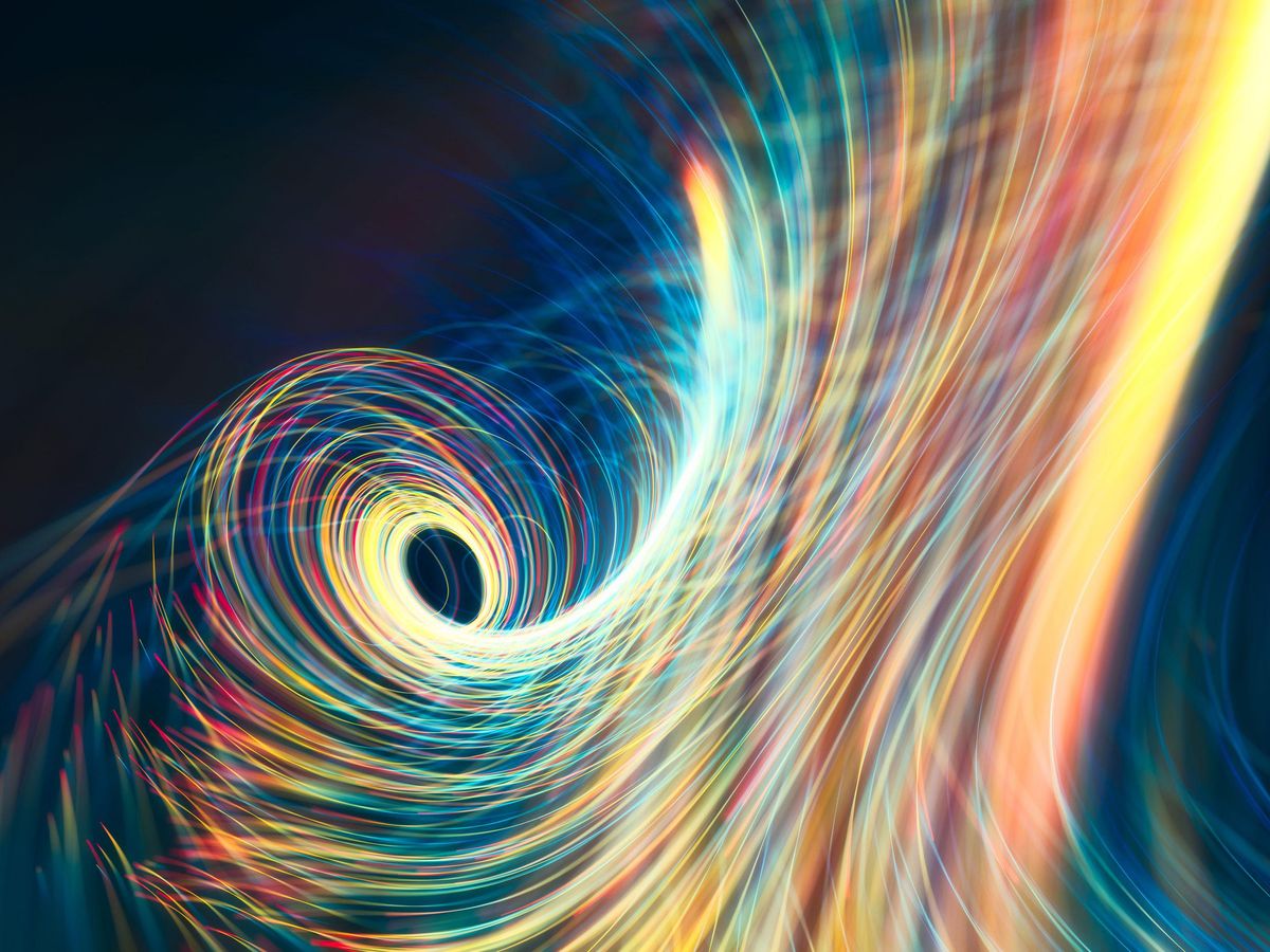 Differently-colored lines of light swirl on a dark background