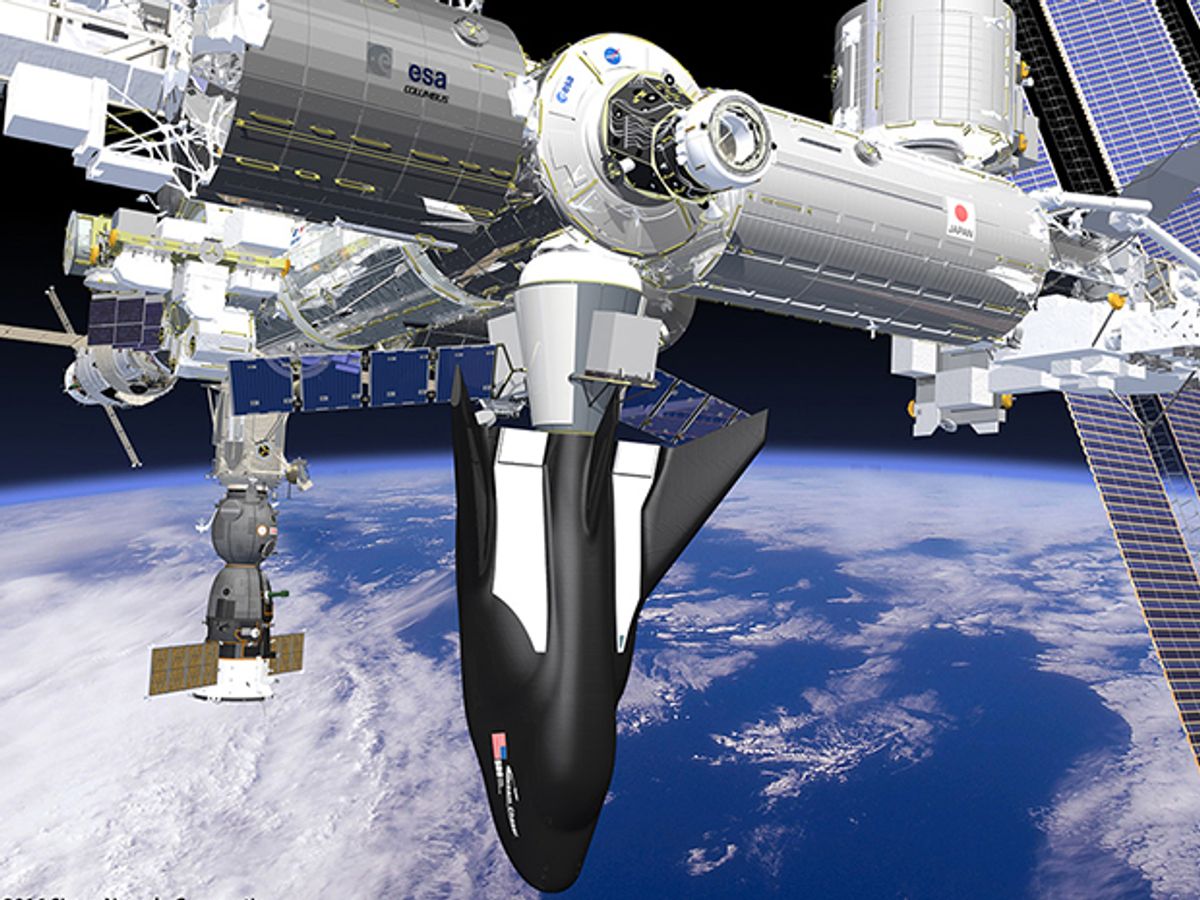 DreamChaser spacecraft docked at the International Space Station.