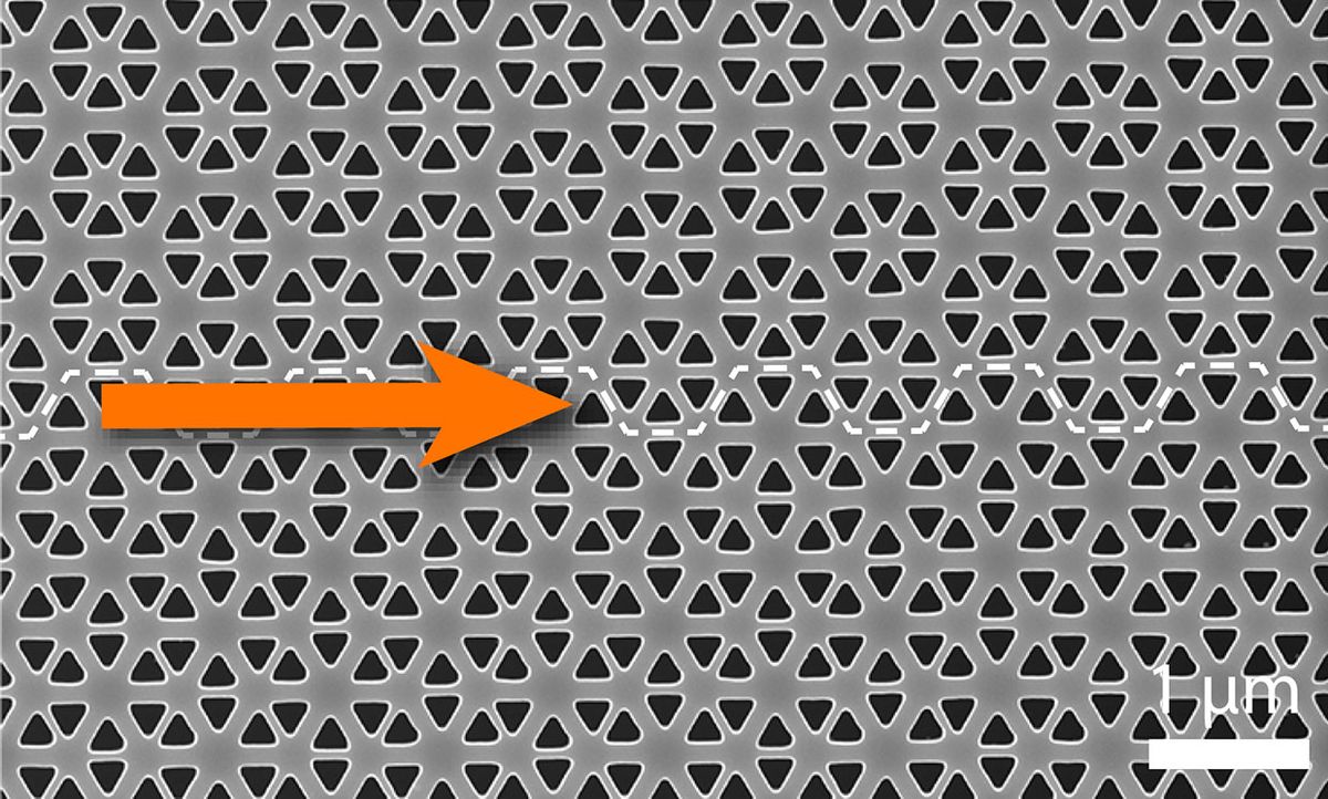 Electron microscopy image of topological photonic crystals in a perforated slab of silicon.