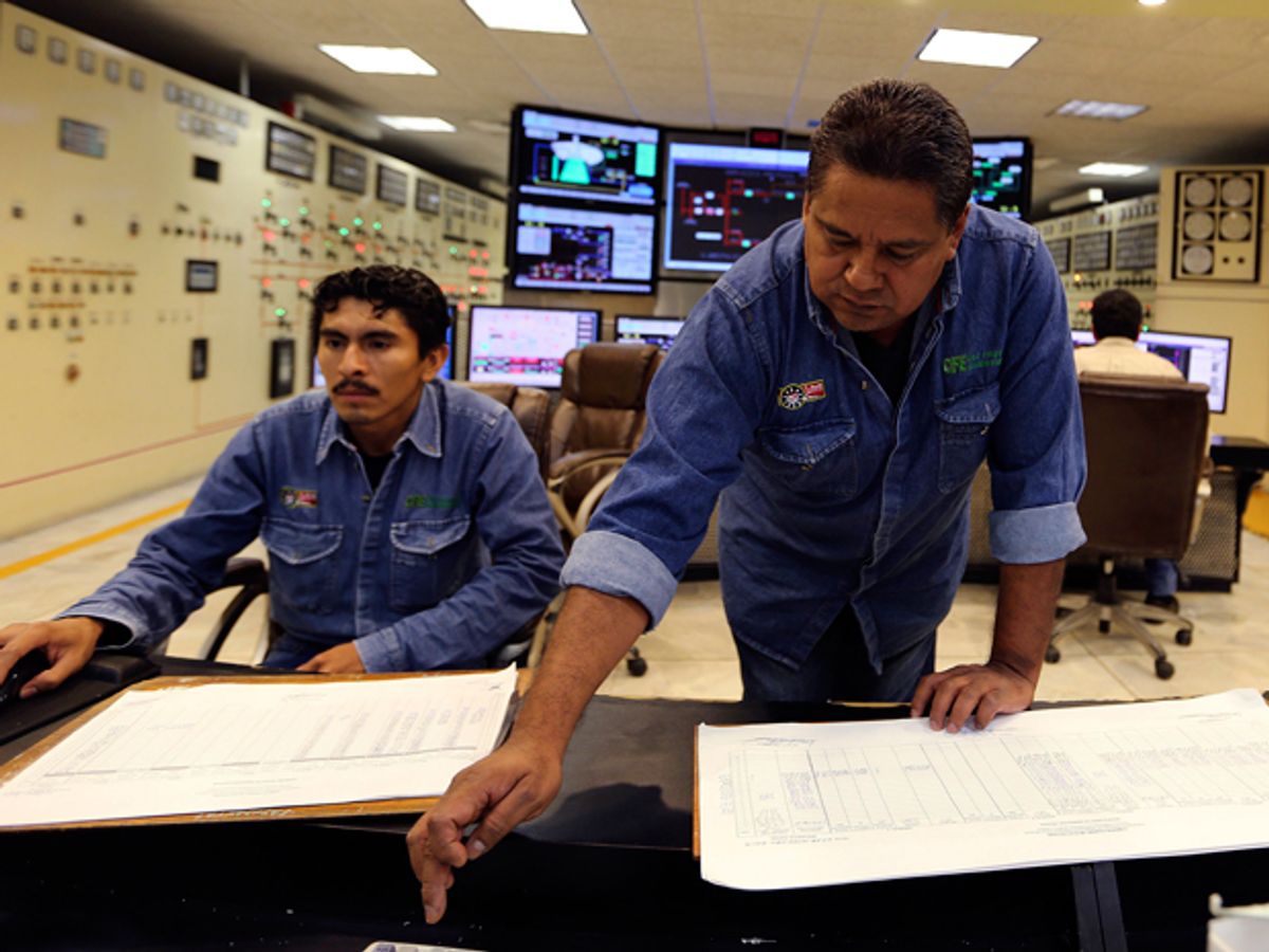 Employees work in the control room at the Comision Federal de Electricidad's (CFE) Manuel M. Torres Dam and hydroelectric power station in the state of Chiapas near Chicoasen, Mexico, on Monday, May 27, 2013. 