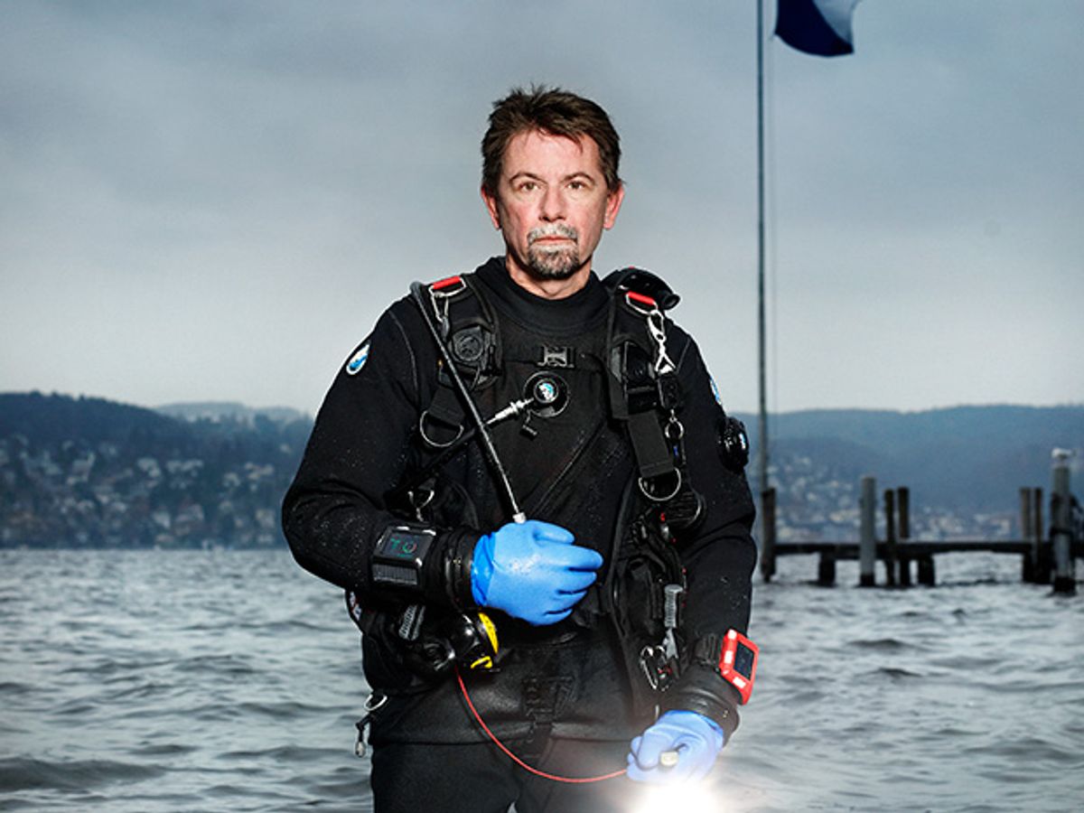 Ernst Völlm emerges from the deep with his dive computer on his wrist.