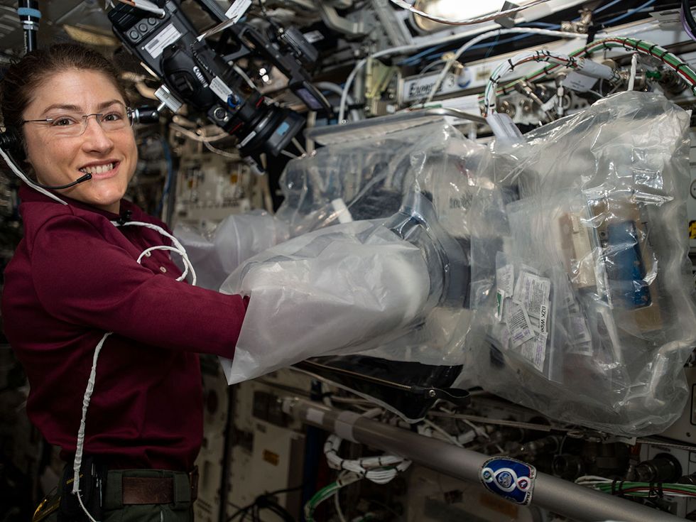 Expedition 60 Flight Engineer Christina Koch of NASA activates the new BioFabrication Facility to test its ability to print cells.