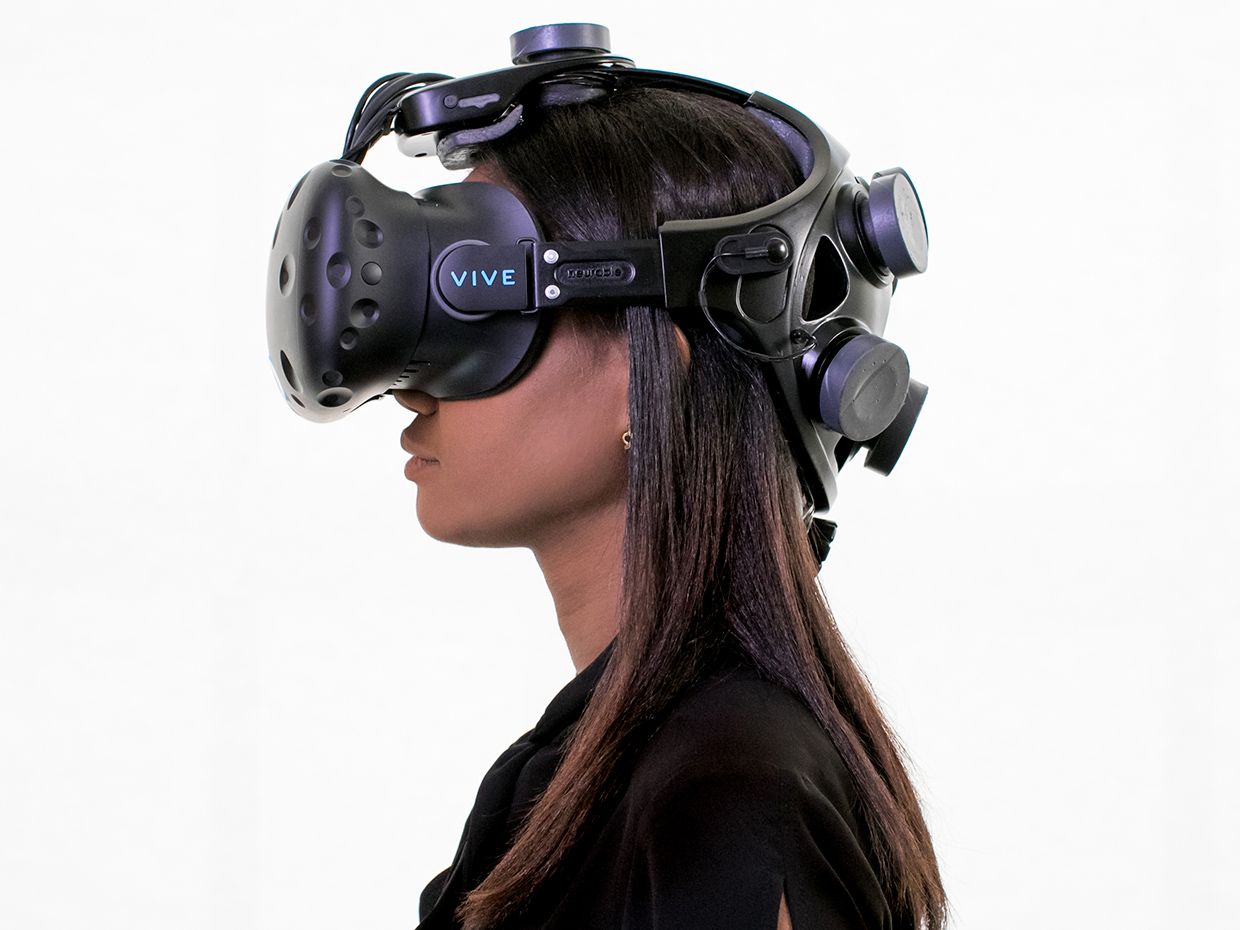 Photo of person wearing VR headset. 