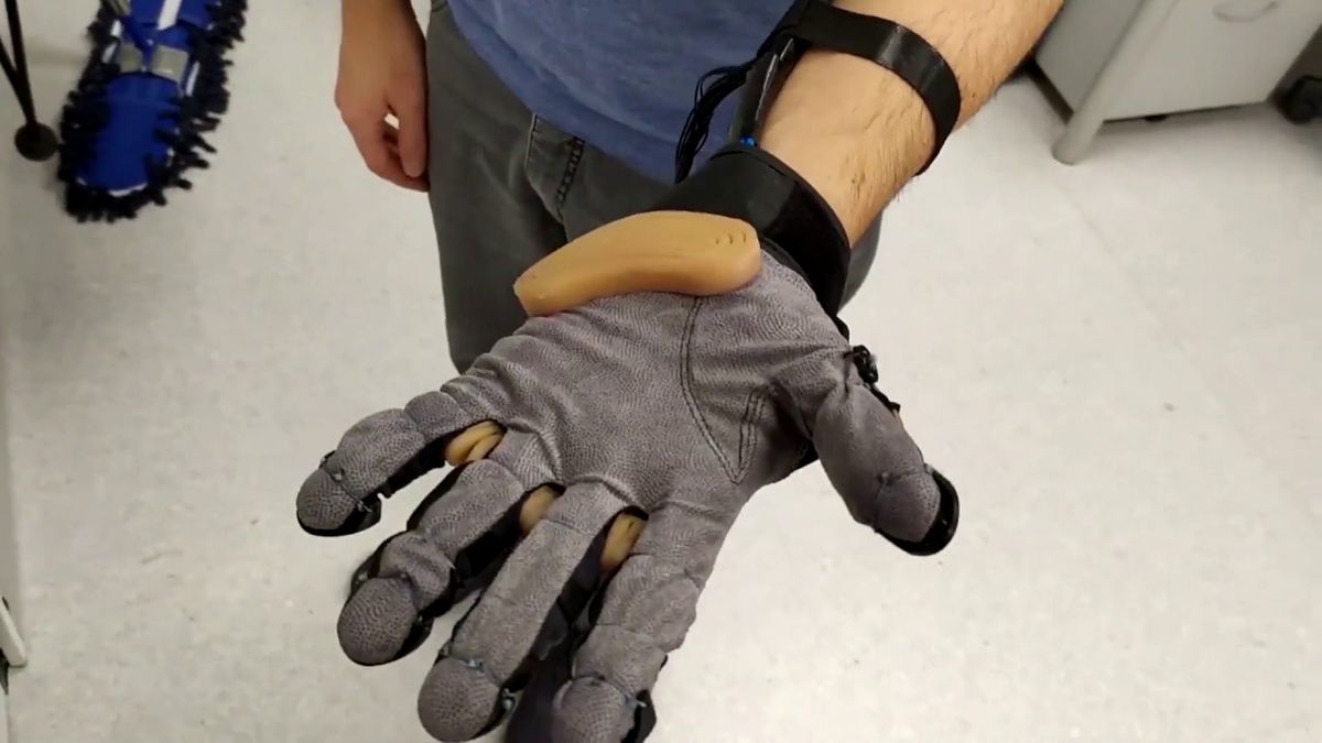 Faboratory at Yale University's soft exoskeleton glove with telescopic extra thumb