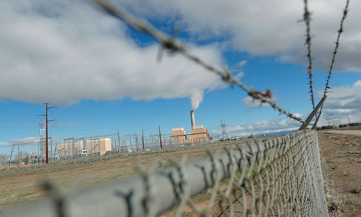 Fencing surrounds the coal-fired Intermountain Power Plant on March 28, 2016 outside Delta, Utah.