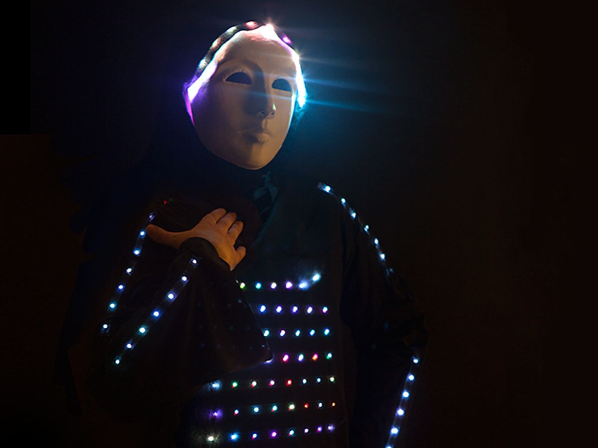 Human wearing the costume’s light display.