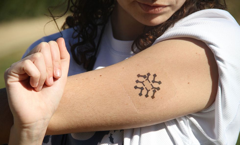 ICFO photograph of the flexible wireless sensor on a woman's arm.
