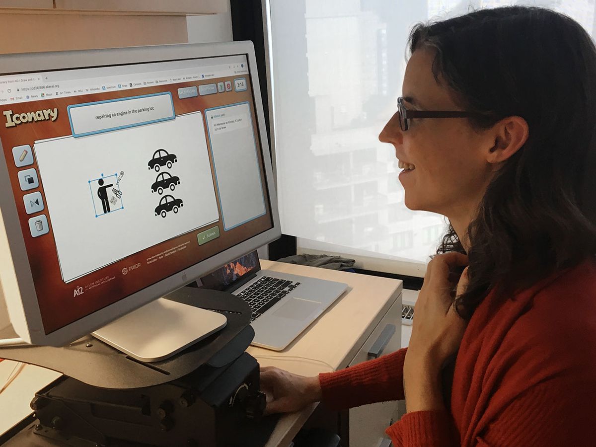 IEEE Spectrum editor Eliza Strickland draws and uses icons to convey the phrase 'repairing an engine in the parking lot' for Iconary.