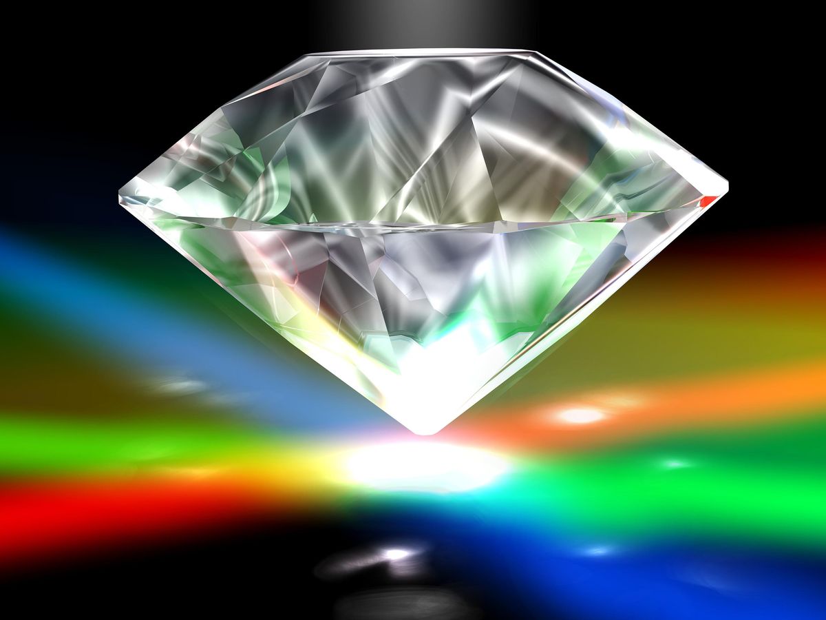 Illustration of a diamond, with beams of color below it.