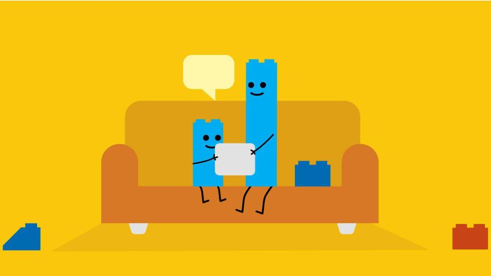 illustration of a lego child and lego adult sitting on a couch