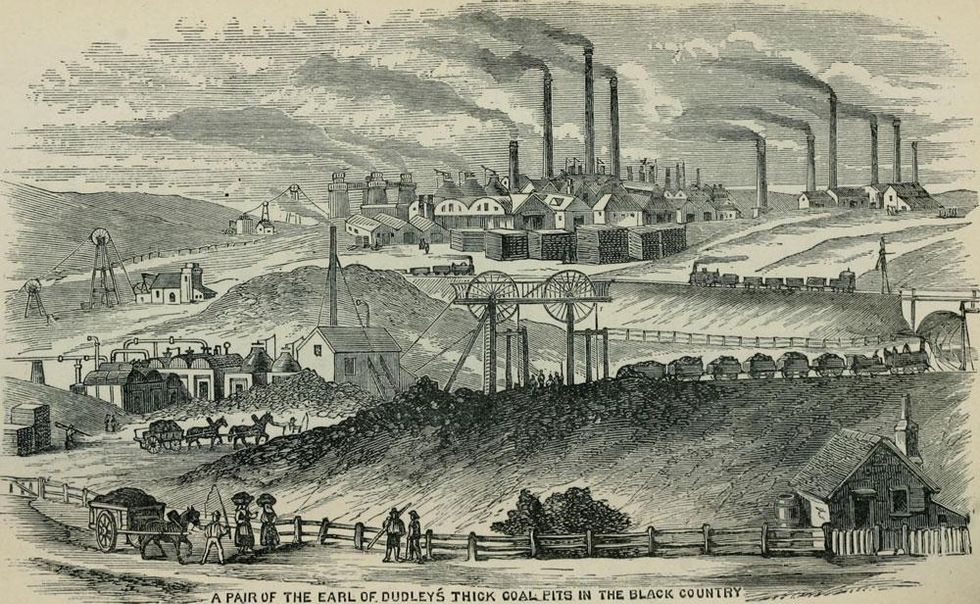 Illustration of coal mines and iron works in England, with horse carts, a railroad, and smoking chimneys.