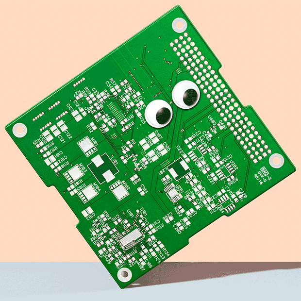 Image of a circuit board with googly eyes on it.