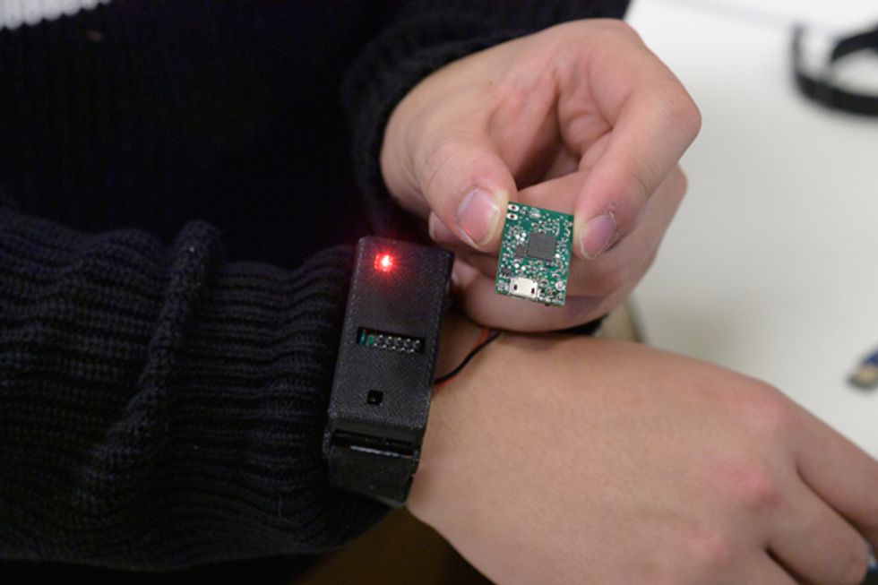 Image of a wearable wrist transmitter with usb capabilties.