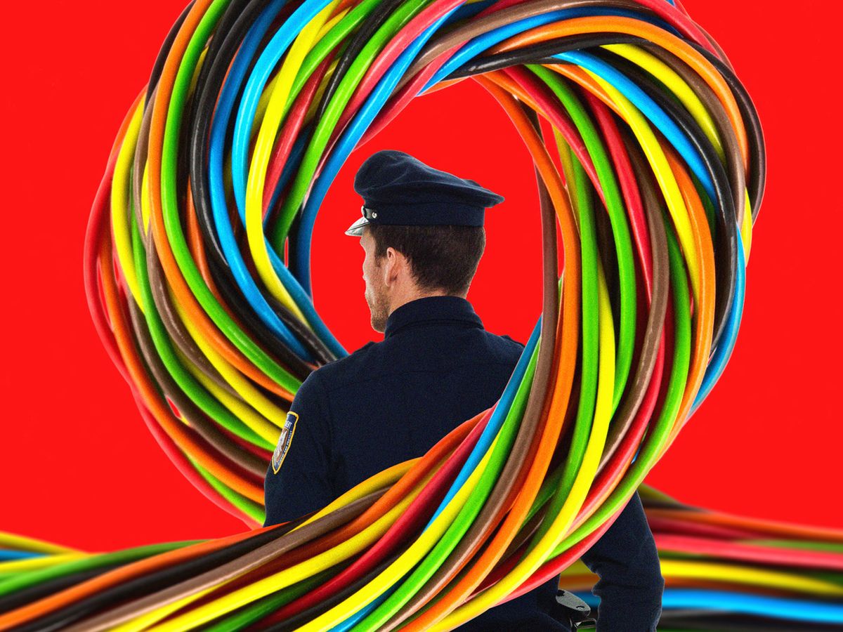 Image of a wire around a police officer.