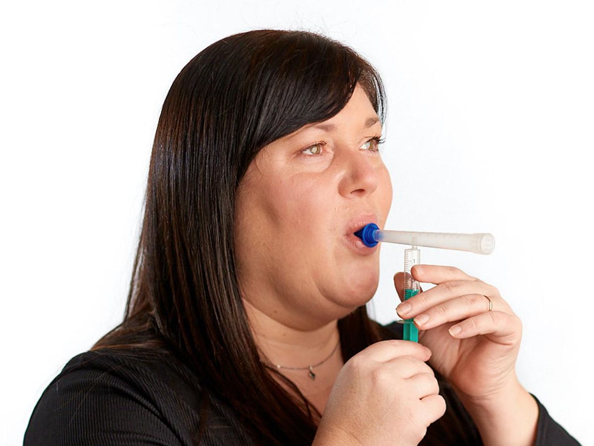 Image of a women using the Imspex breathspec.