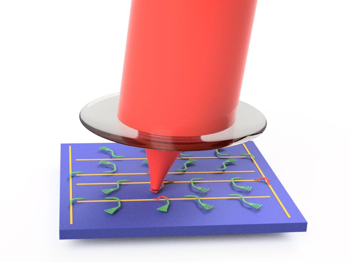 Image of blue square laid flat with colored lines crisscrossing its surface and a big, red laser beam being focused down onto a point on the blue square