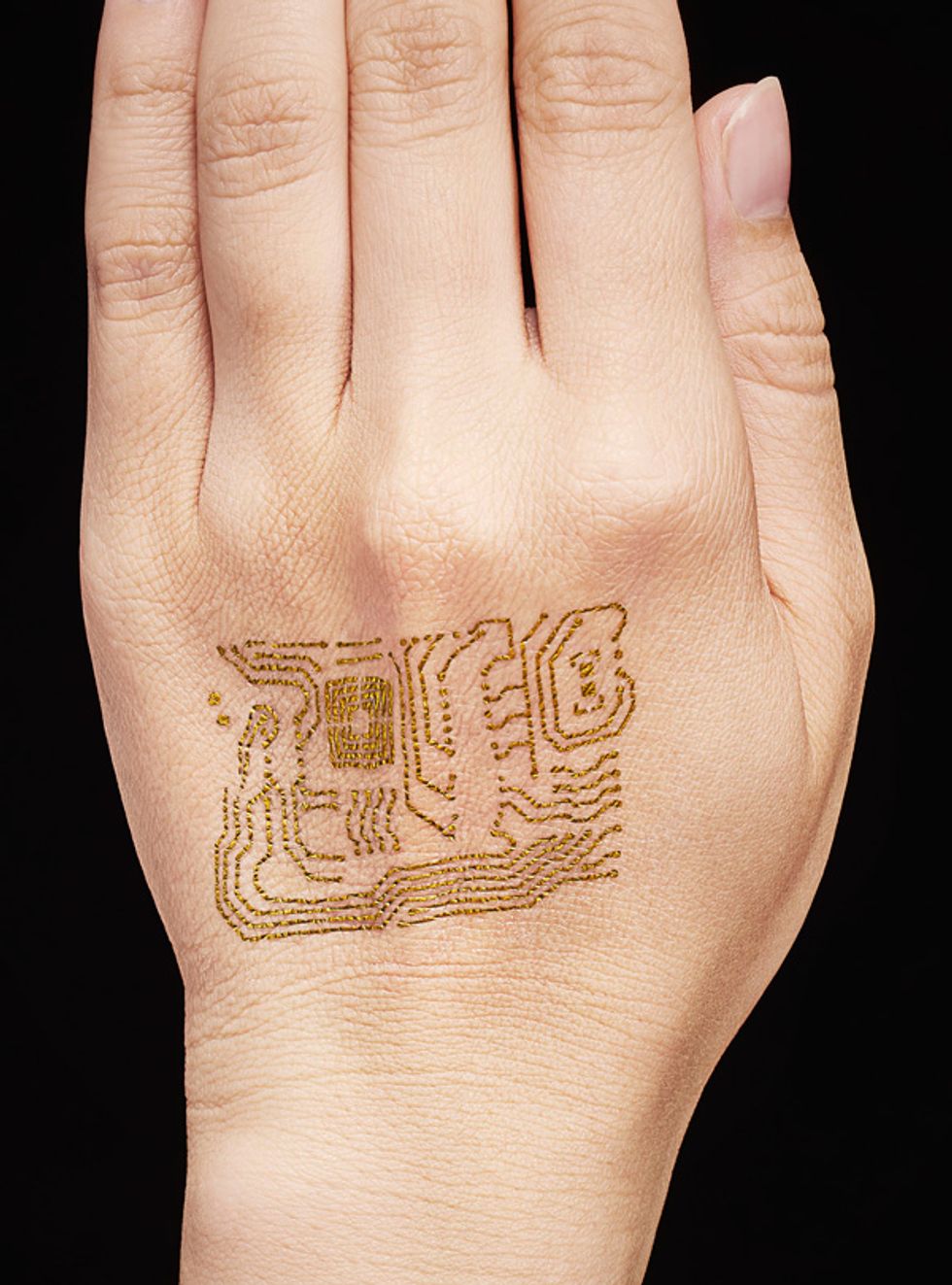 Image of hand with gold mesh for skin display.