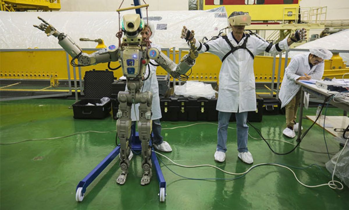 Image of the humanoid robot, FEDOR, with researchers