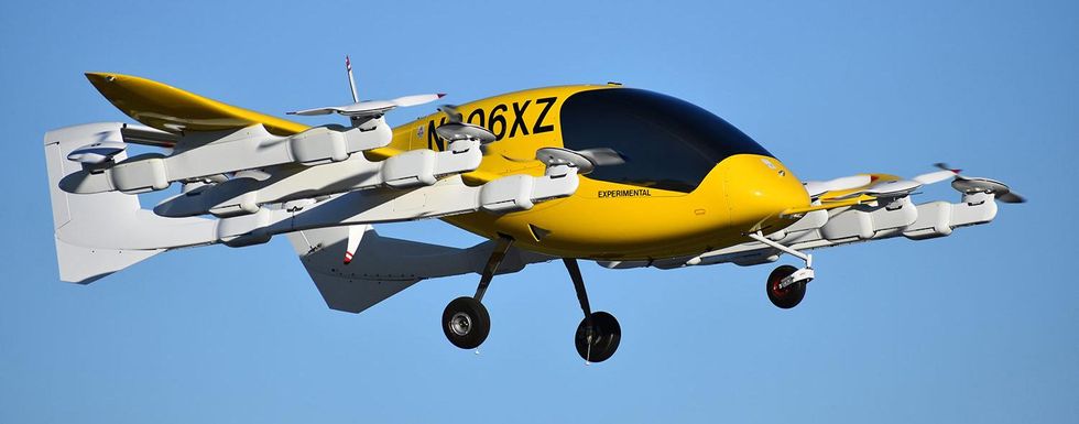 Image of the Wisk Aero aircraft flying in the sky.