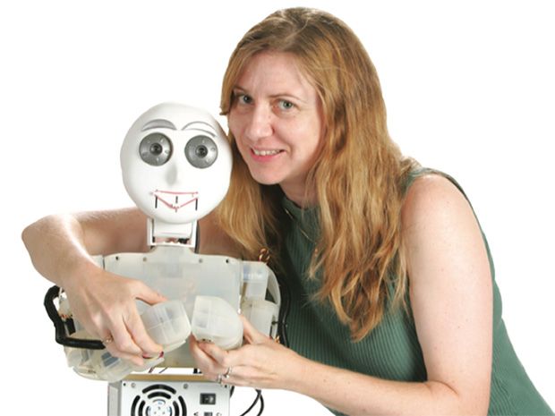 photo of Maja Mataric ́ with robot