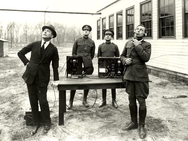 AT&T employees listen in on an early trial of air-to-ground voice communication.