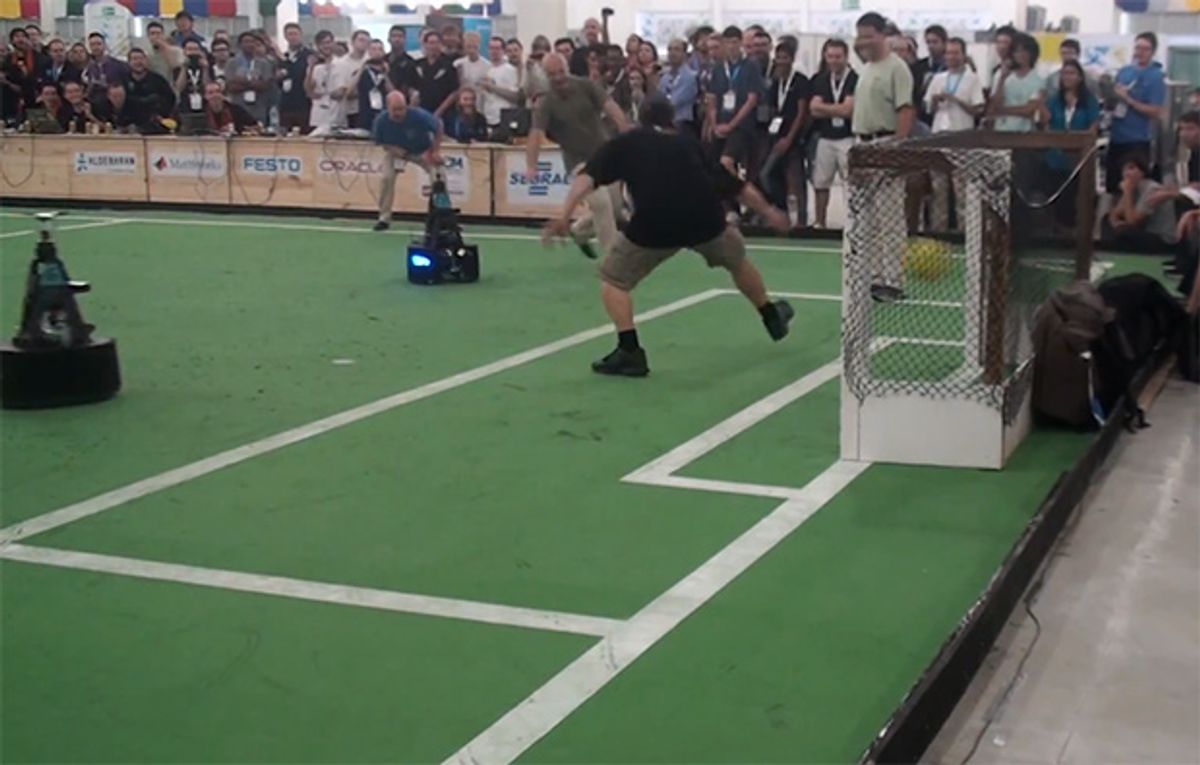 Soccer Robots Score on Humans at RoboCup: GOOOOOOAL!