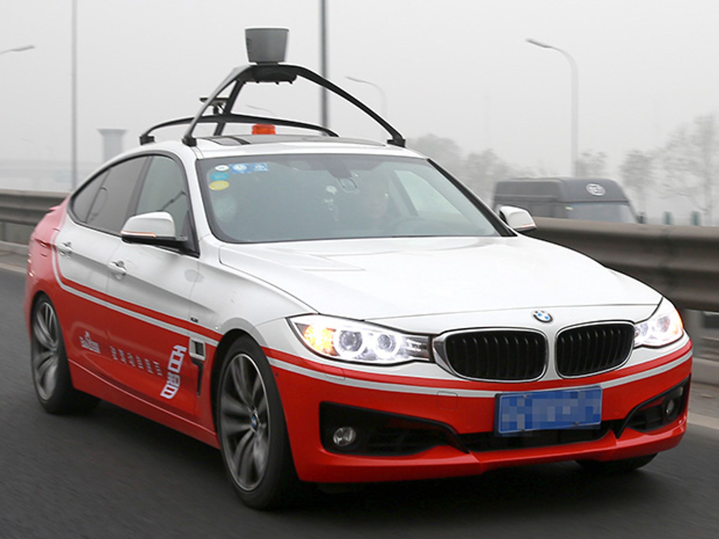Baidu's Robot Car Marks Self-Driving Milestone in Beijing