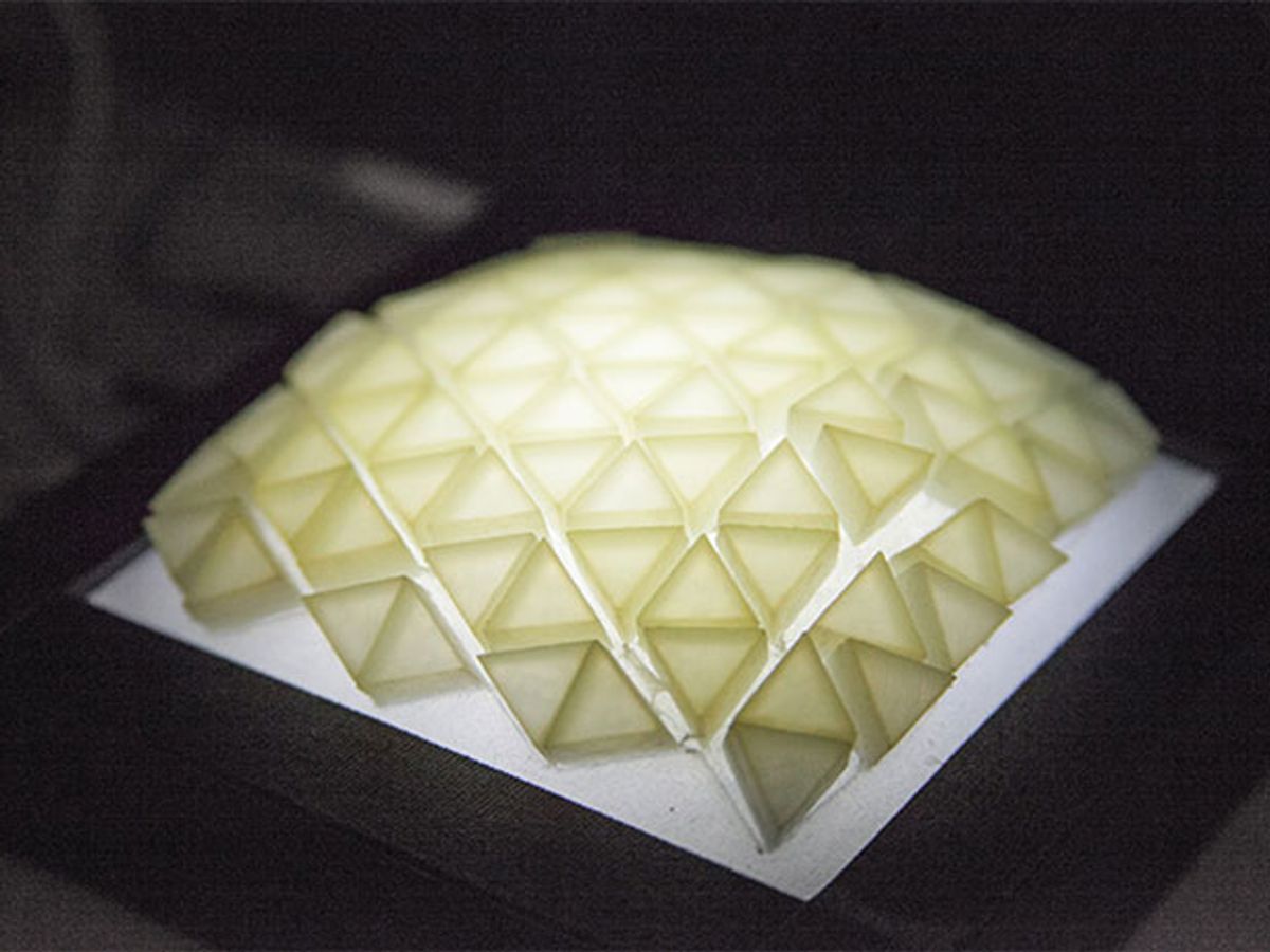 Exoskin: a Programmable Hybrid Shape-Changing Material