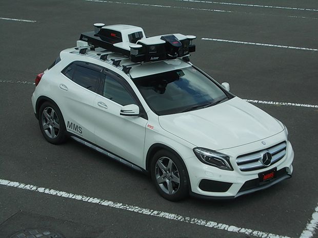 A vehicle sporting a roof-mounted mobile mapping unit prepares to capture the data that will let cars safely drive themselves