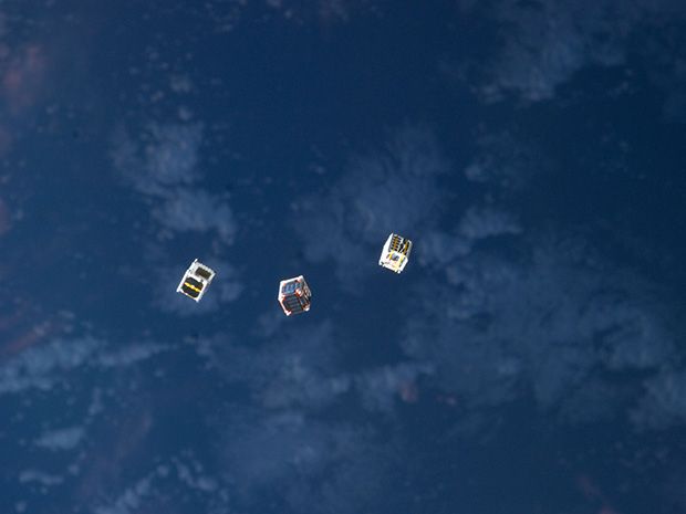 Image of small cube satellites in space courtesy of NASA