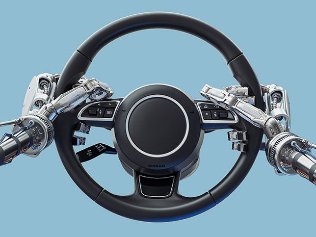 robot clutching steering wheel