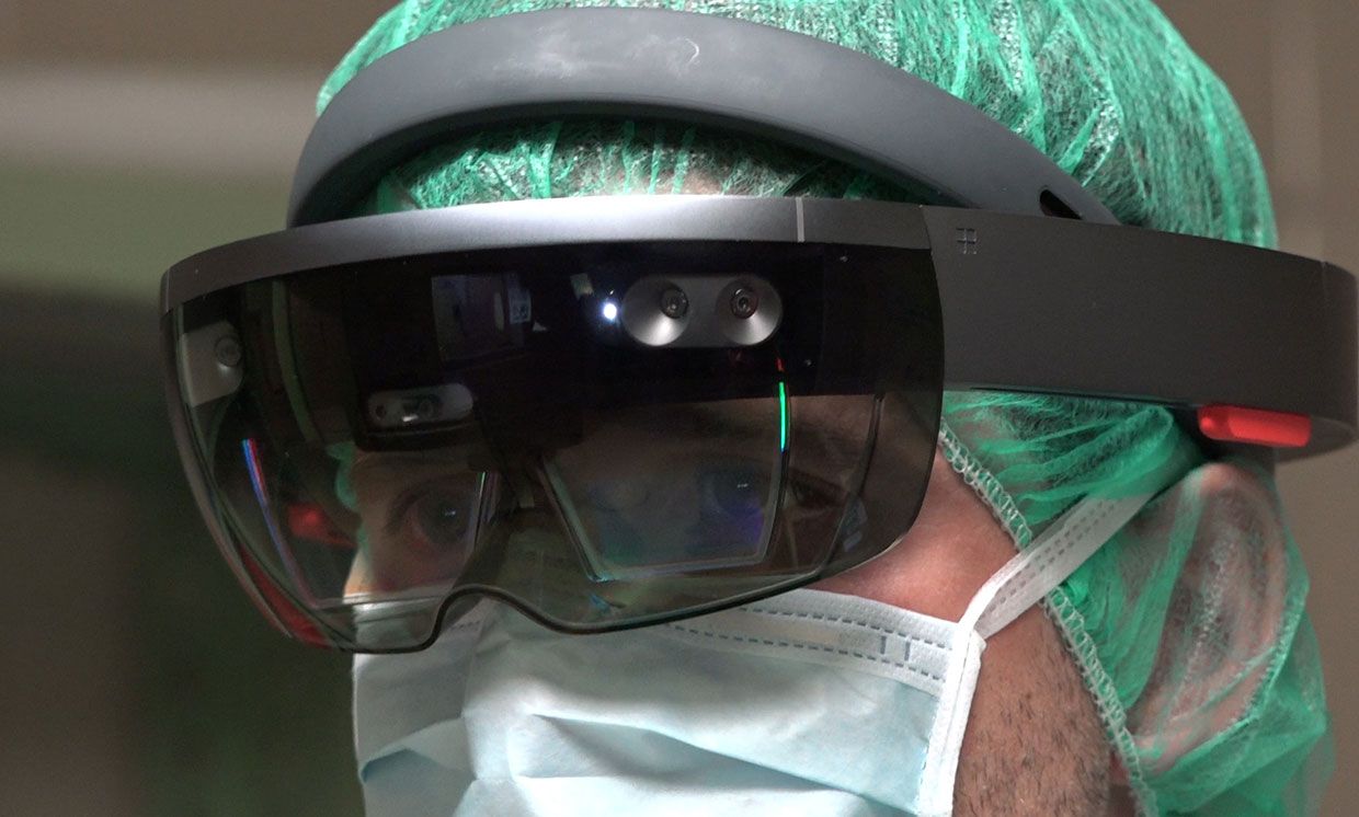 Close up of a surgeon wearing a Microsoft Hololens.