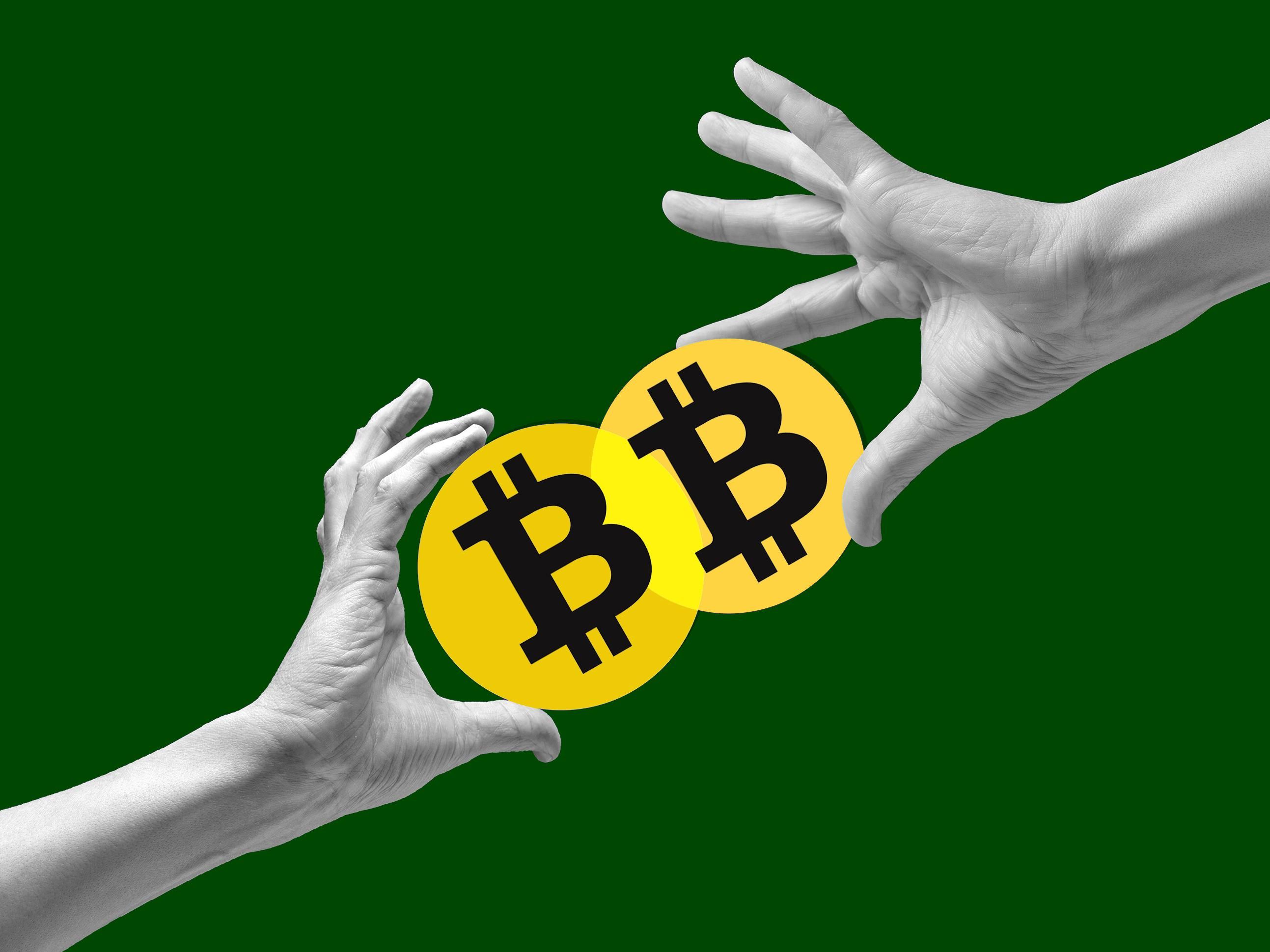 Photo collage of two hands holding circles with the Bitcoin symbol towards each other.
