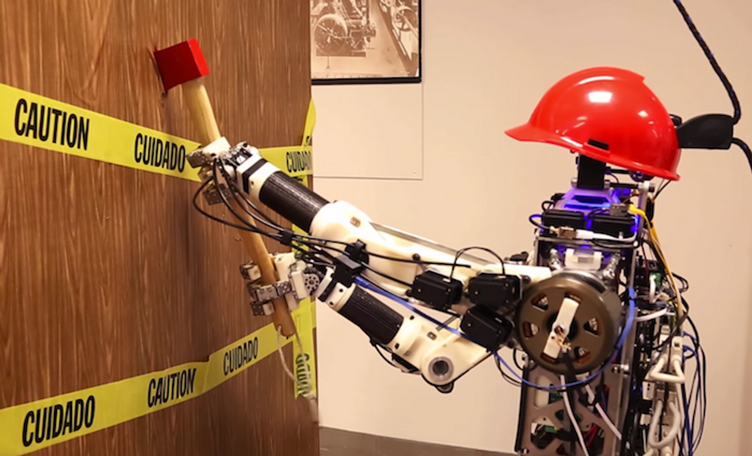 Video Friday: Robot With Axe, Drone With Claw, and Droid With Kittens