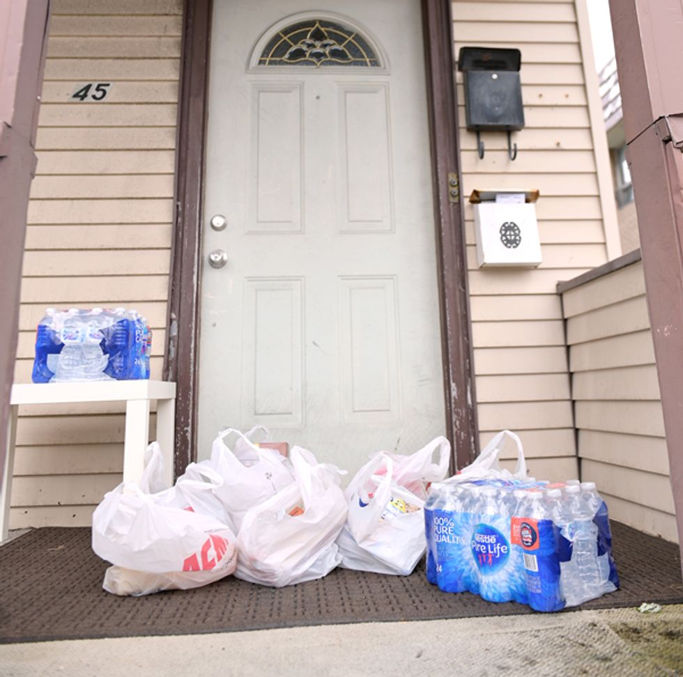 Images of a Instacart grocery order outside a home.